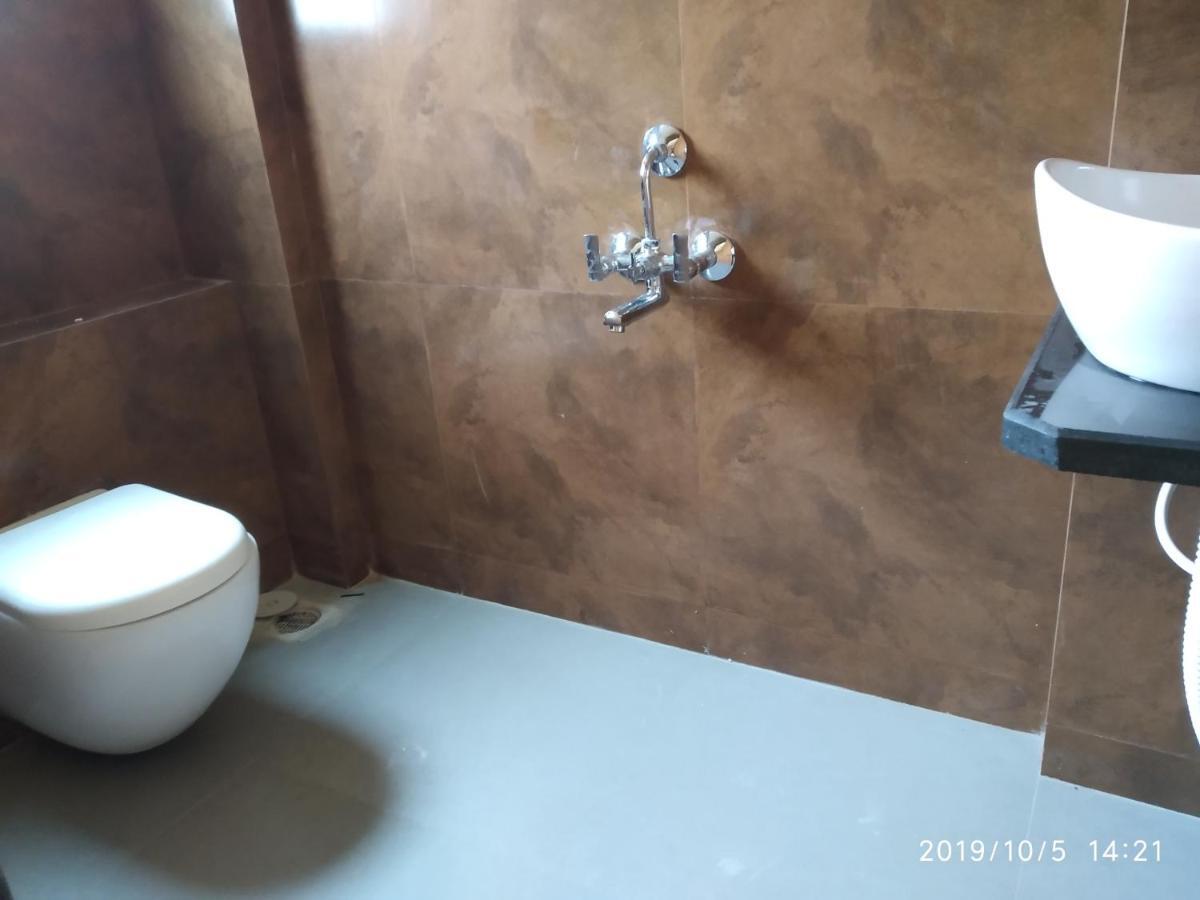 Lotus Hotel Nagaon Beach アリバグ エクステリア 写真